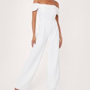 White jumpsuit, tags still on, never worn